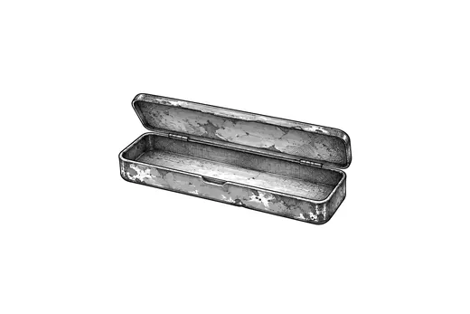 An open worn metal pencil tin.